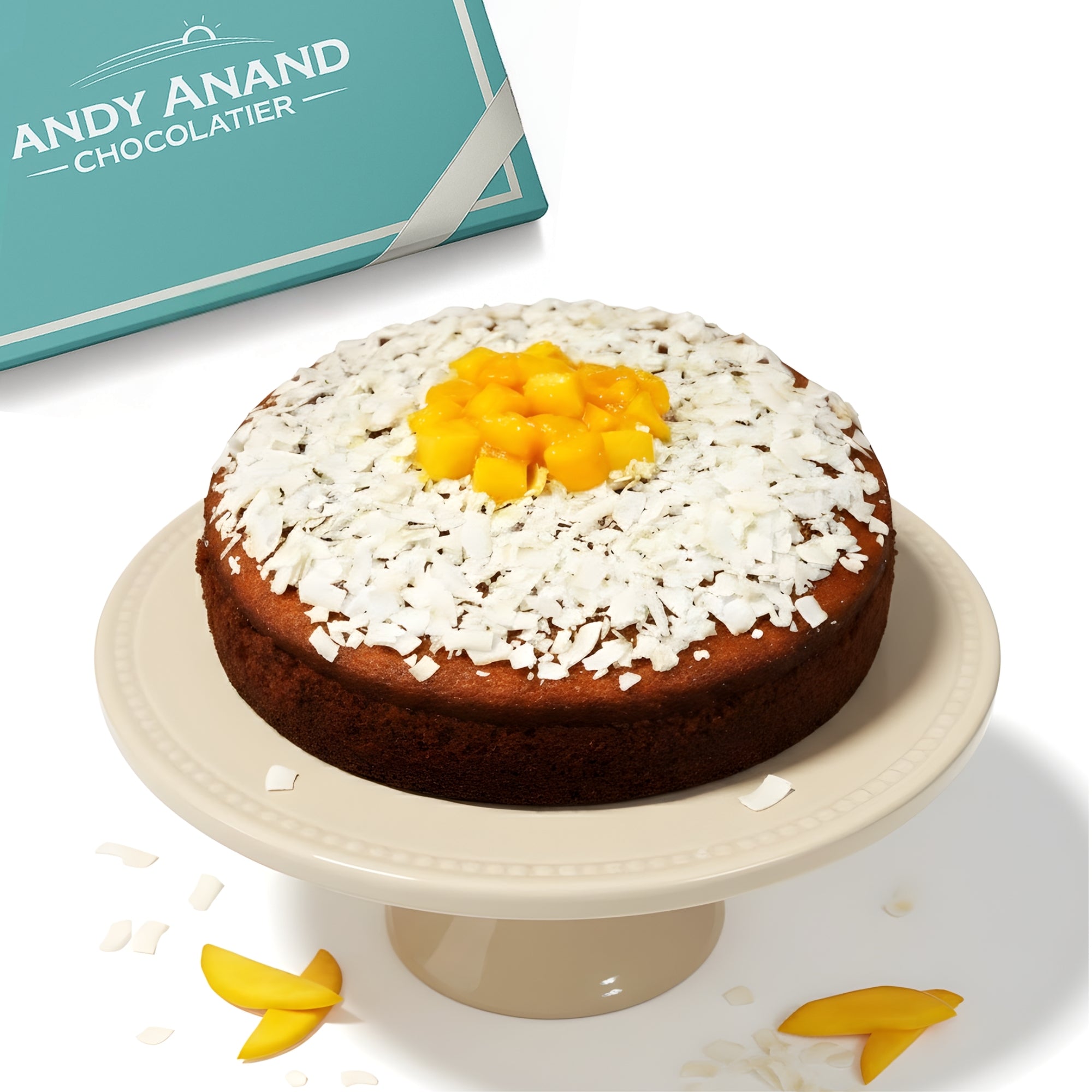 Gâteau à la mangue et à la noix de coco trempé sans sucre d'Andy Anand (2,5 lb) - Profitez du goût incroyable d'un gâteau classique à la mangue et à la noix de coco sans sucre ! Trempé dans de la purée de mangue fraîche