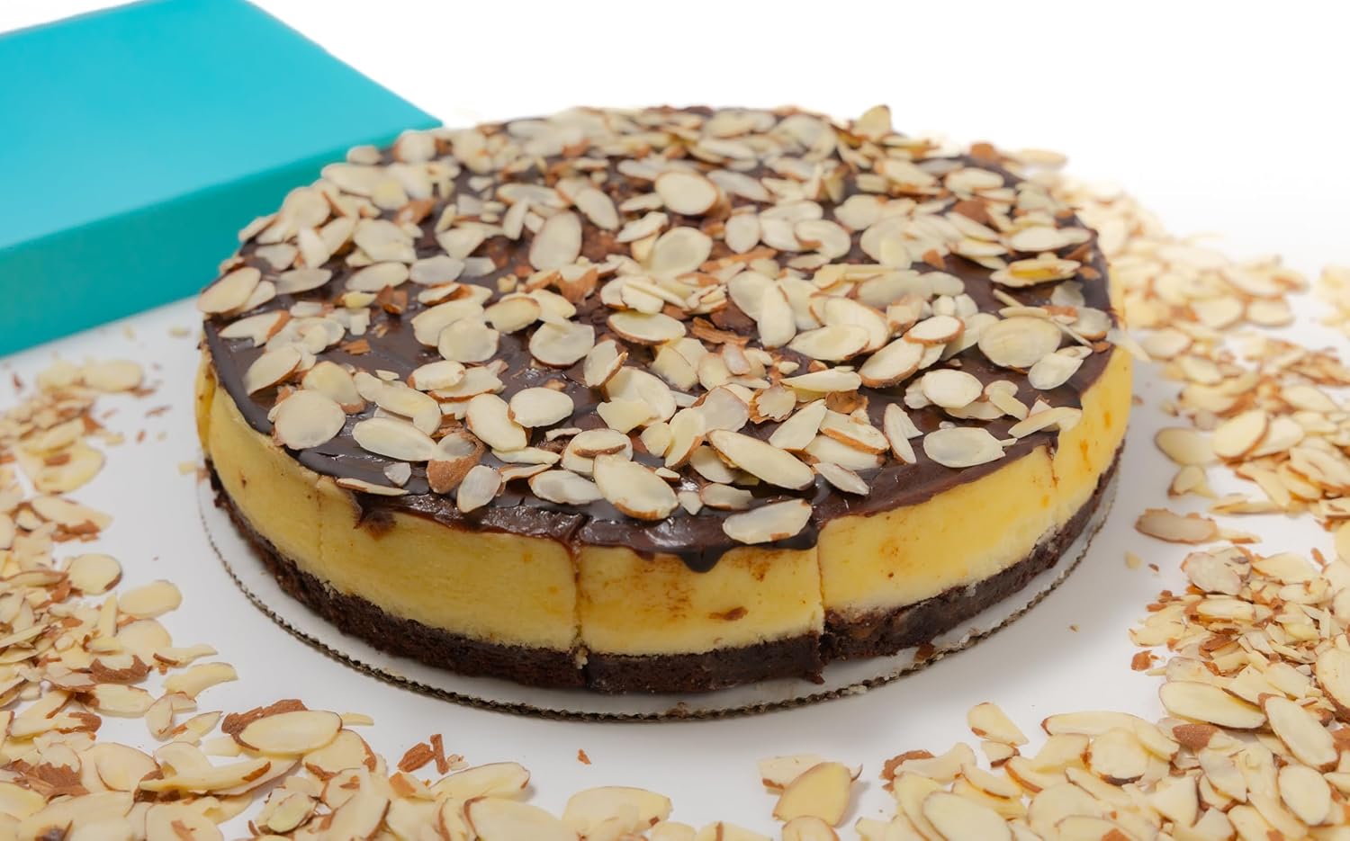 Andyanand Food & Beverages > Desserts & Sweets > Bakery > Cheesecake Andy Anand Fudge Brownie Cheesecake, 9-Inch, 2.8 lb – Halal, Real California Cream Cheese, No Preservatives, Birthday & Holiday Gift Box Fudge Brownie Cheesecake | Halal, Ships Nationwide