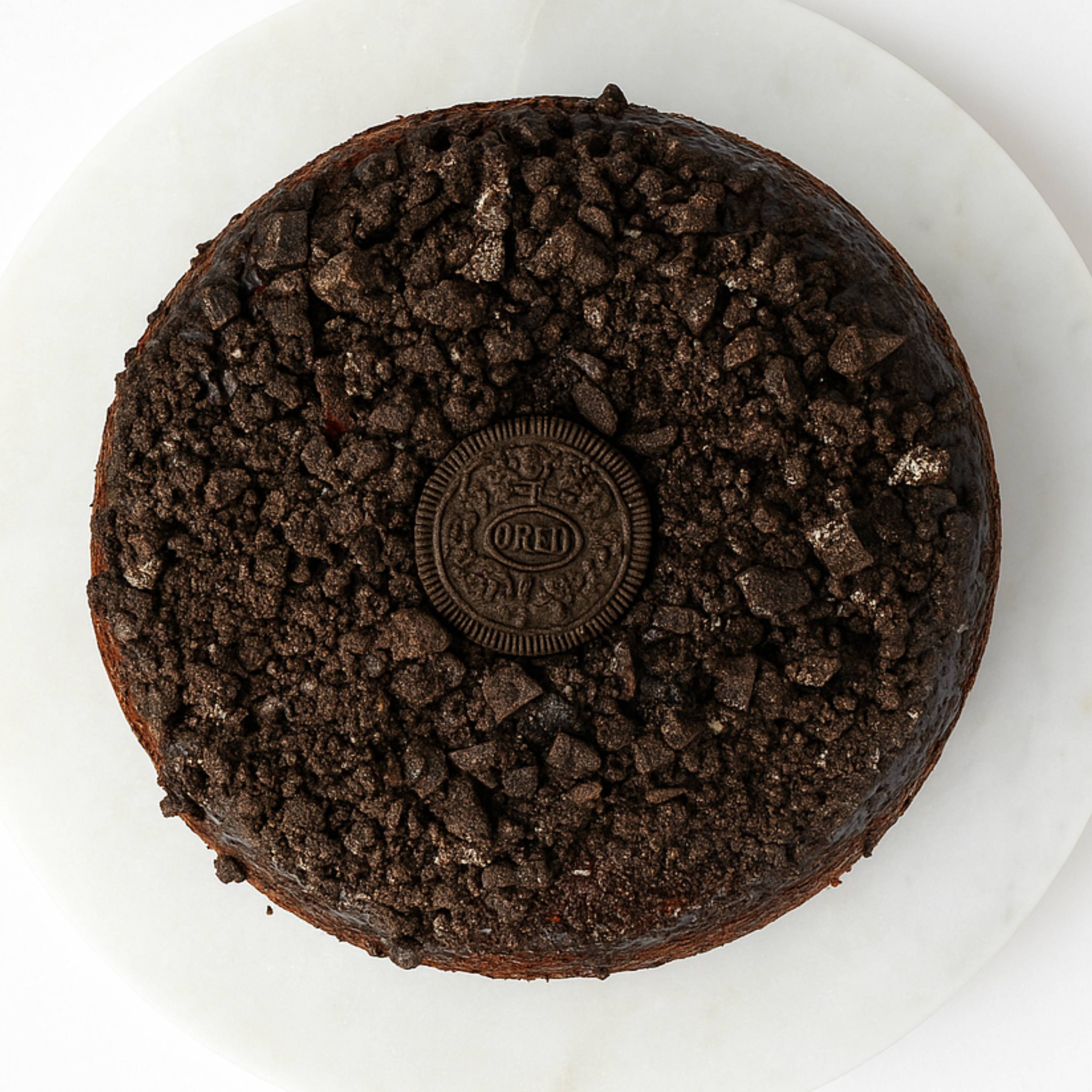 Andy Anand 9" sugar-free cookies cream cake, freshly baked, gluten-free, plated beautifully for gifting.