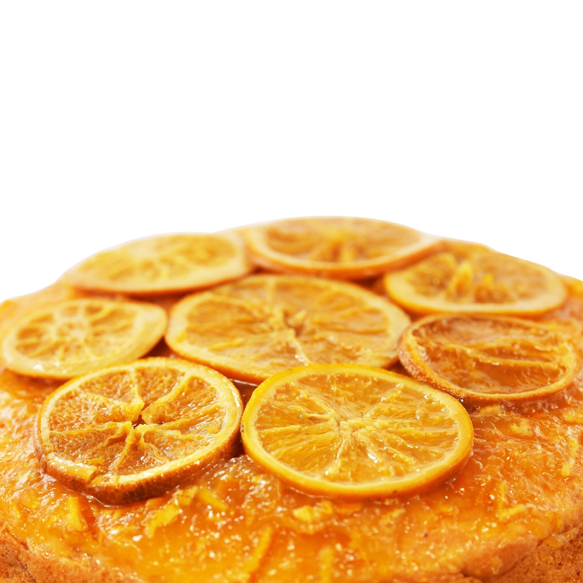 Gluten Free Orange Cake A close-up of Andy Anand Gluten Free Orange Cake, featuring a moist, textured cake topped with candied orange slices. Perfect for those with dietary restrictions, each cake is handcrafted using traditional methods and made with the finest ingredients. Order online for fresh delivery. Andy Anand Chocolates, All Products, Products, Gluten Free Cheesecake & Cake