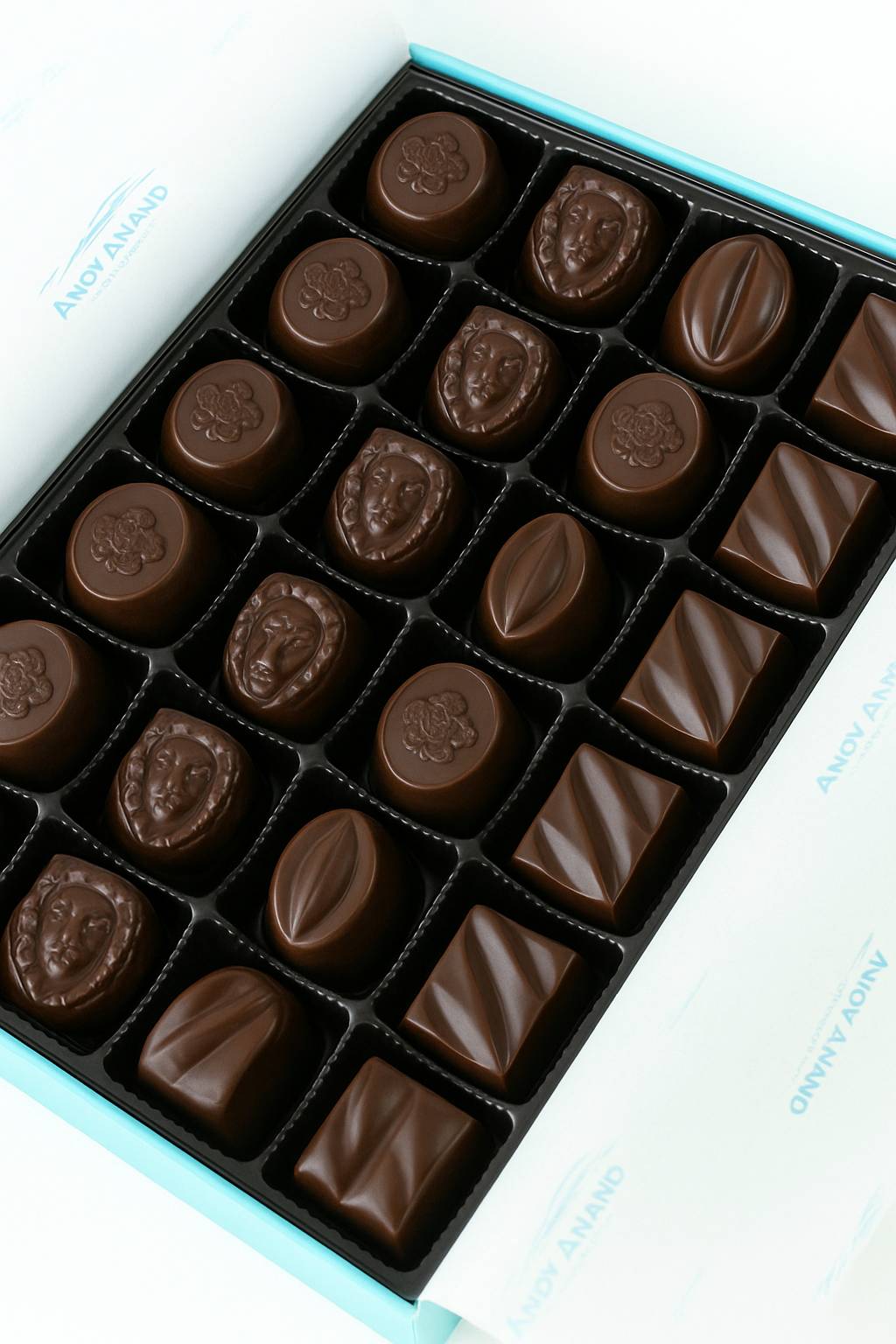 Sugar-free chocolate assortment by Andy Anand, caramels, butter creams, clusters, 60% cocoa, packed in a beautiful box.