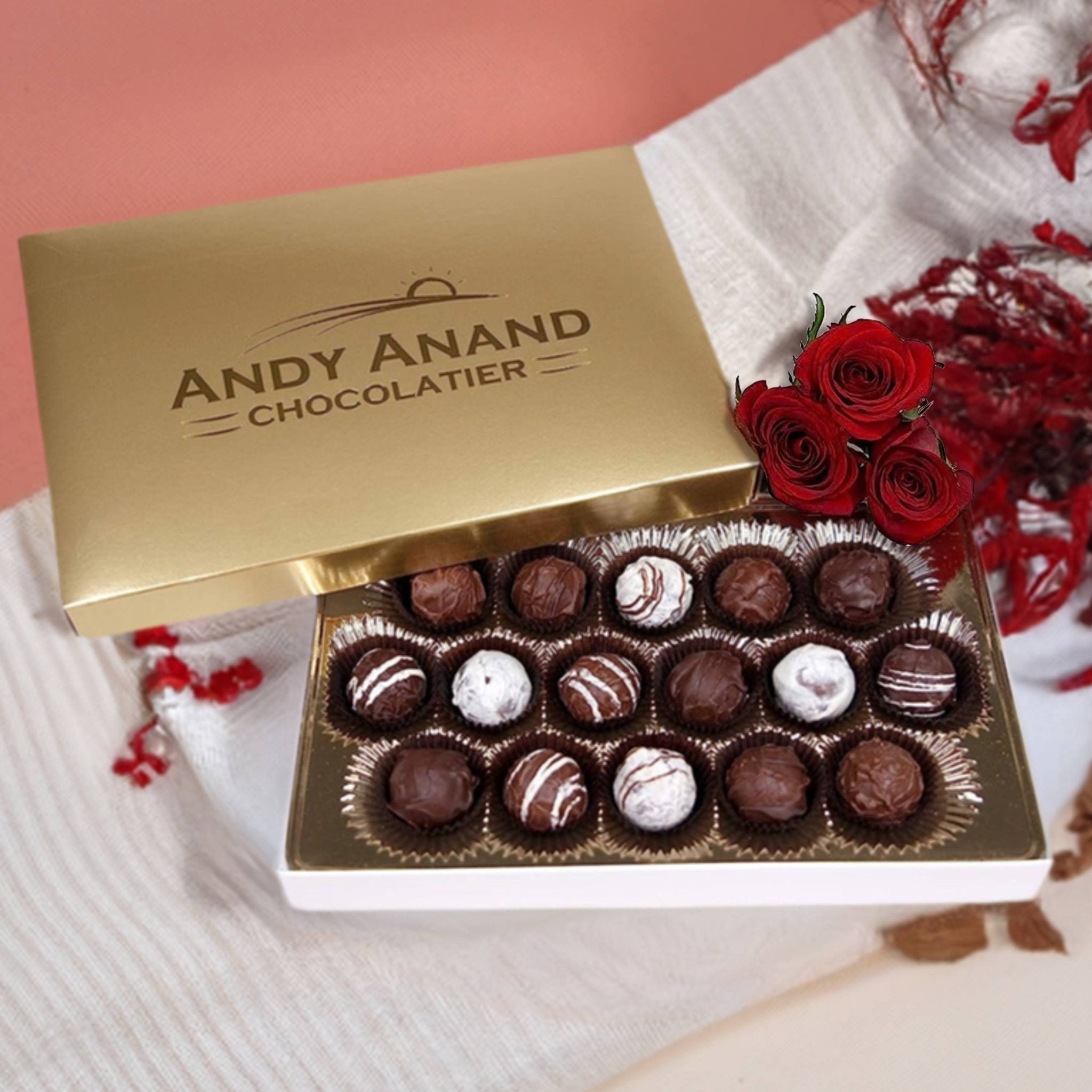 Exquisite 24-piece Belgian chocolate truffle gift box featuring decadent rum, Irish cream, and Kahlua flavors, expertly crafted by Andy Anand Chocolates. All Products, Chocolate Truffles- Free 2nd Day Air.
