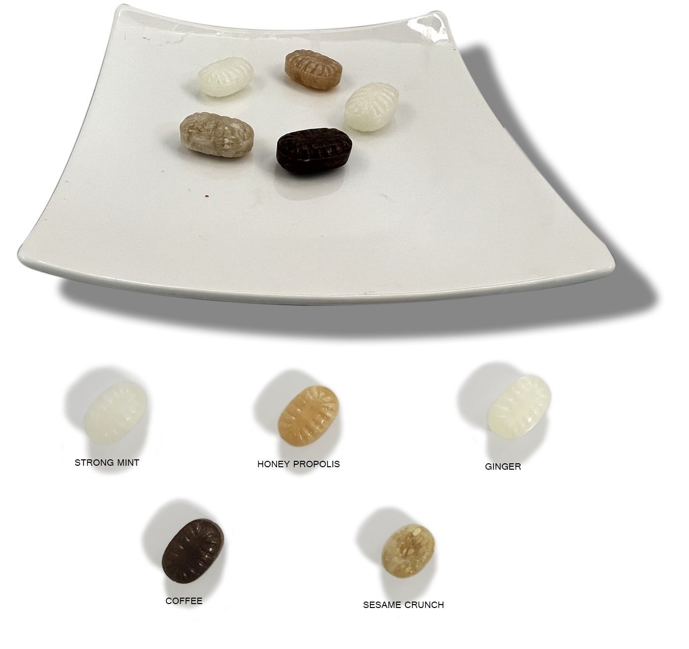 Andy Anand Sugar Free Hard Candy An assortment of 70 pieces of sugar-free hard candies in flavors including ginger, coffee, toasted sesame, strong menthol, and propolis, delicately sweetened with natural stevia, displayed on a white plate. Featured in the image are individual candies representing the various flavors named: strong mint, honey propolis, ginger, coffee, and sesame crunch. Andy Anand Chocolates, All Products, Products, Sugar Free Candy