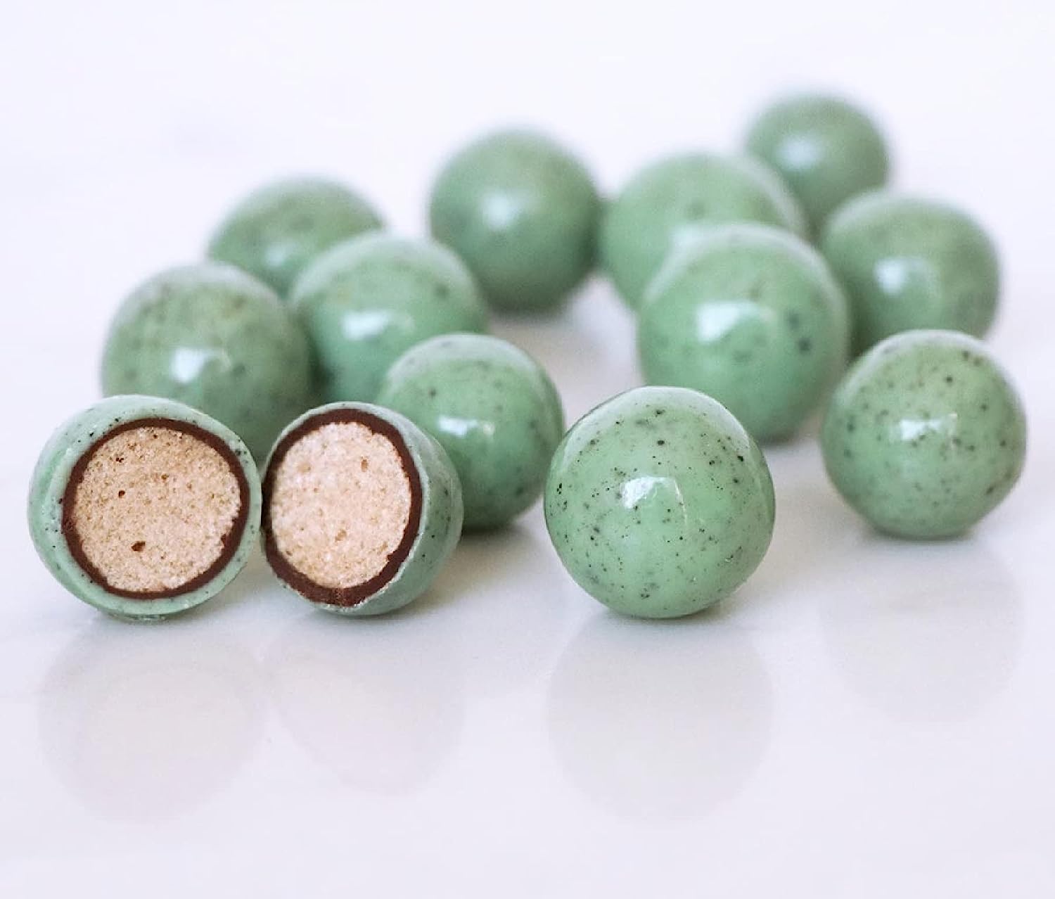 Andy Anand Belgian chocolate mint chip malt balls, 1 lb, beautifully plated for elegant presentation.