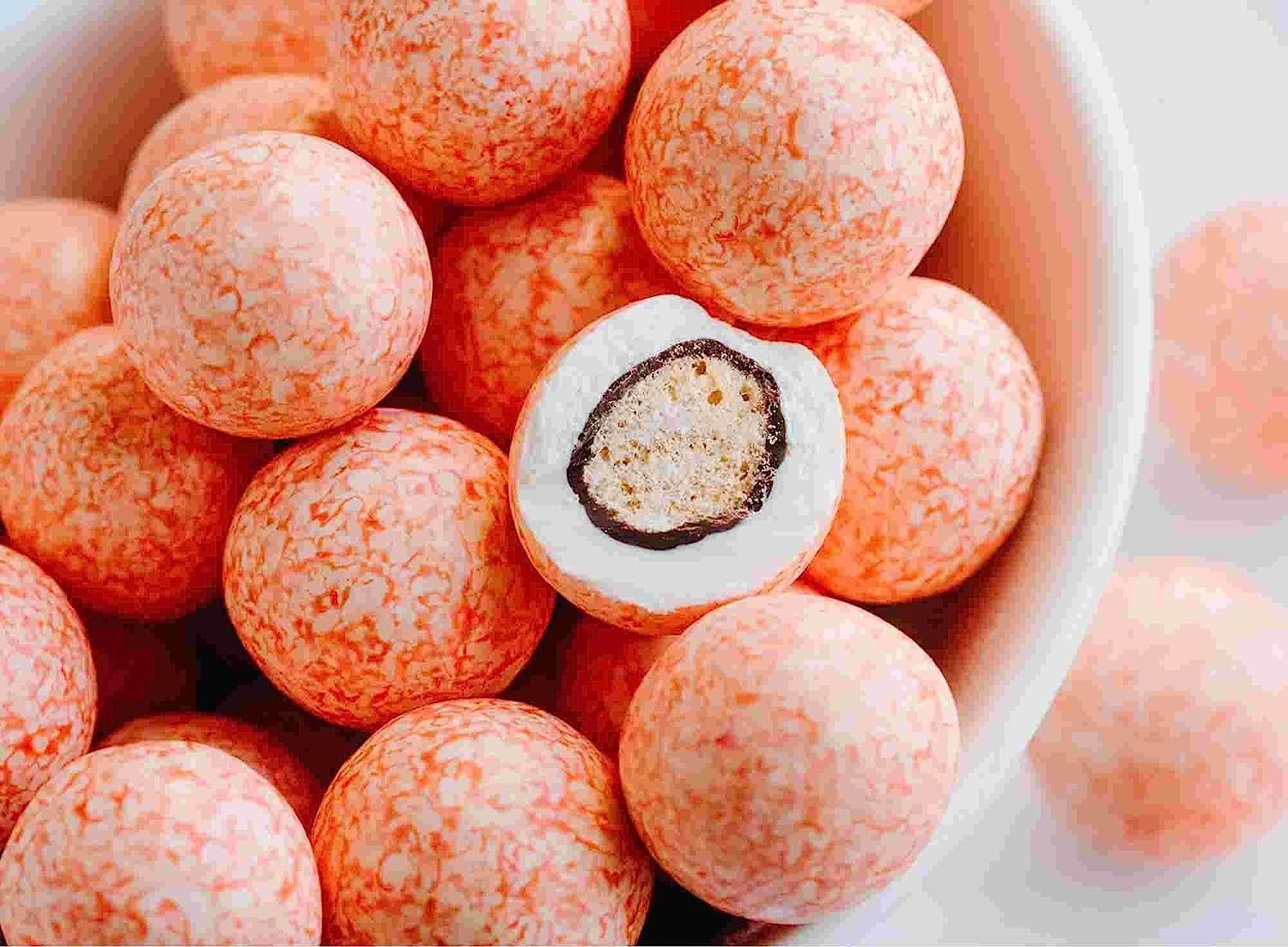 Chocolate Strawberry Malt Ball Delectable Belgian chocolate-covered strawberry waffle cone malt balls with cookie crumbs, an irresistible blend of flavors and textures. Andy Anand Chocolates, All Products, Products, Malt Balls.