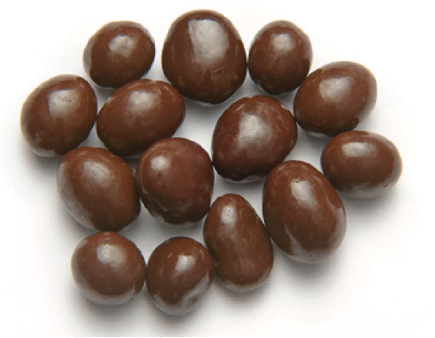 Dark chocolate covered California raisins on a white background.