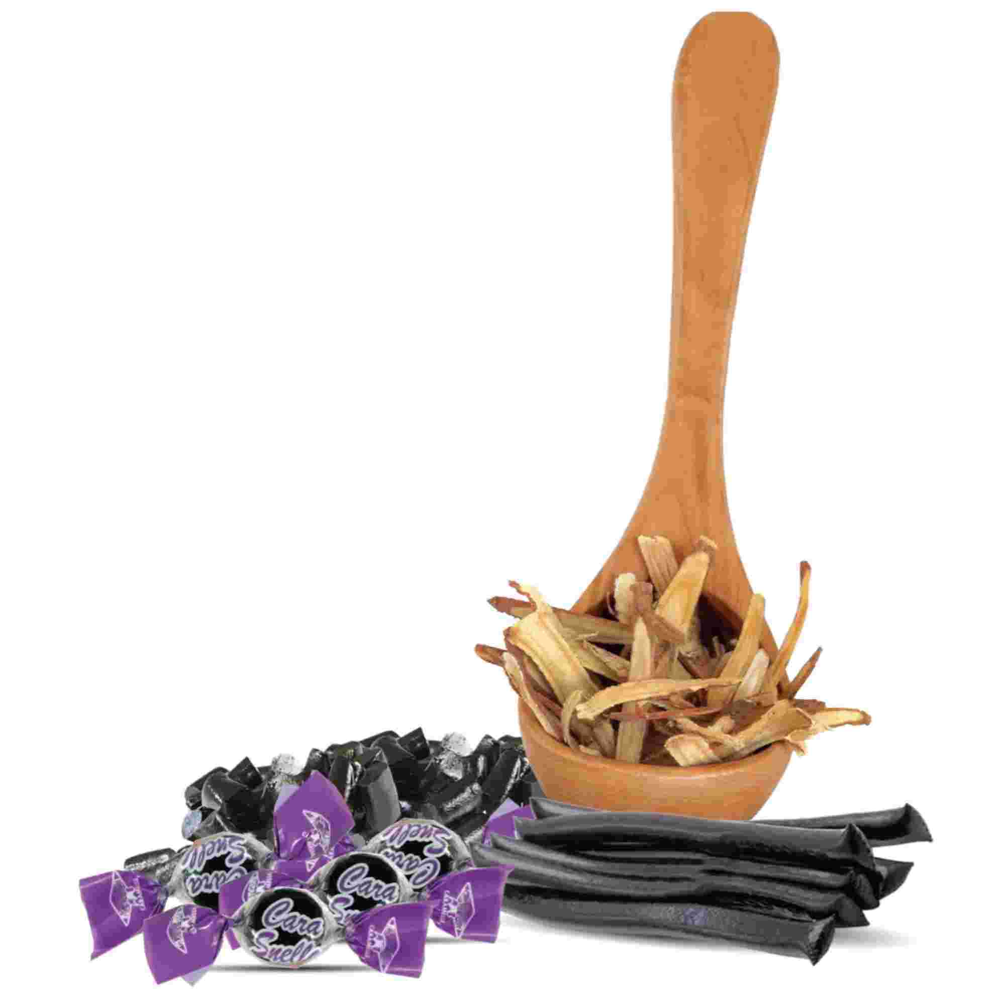 Image of Australian licorice hard candies displayed in a wooden spoon, surrounded by additional decorative ingredients. Alt text: Sugar-free Australian licorice hard candy, made with natural sweeteners and available in an elegant gift box.