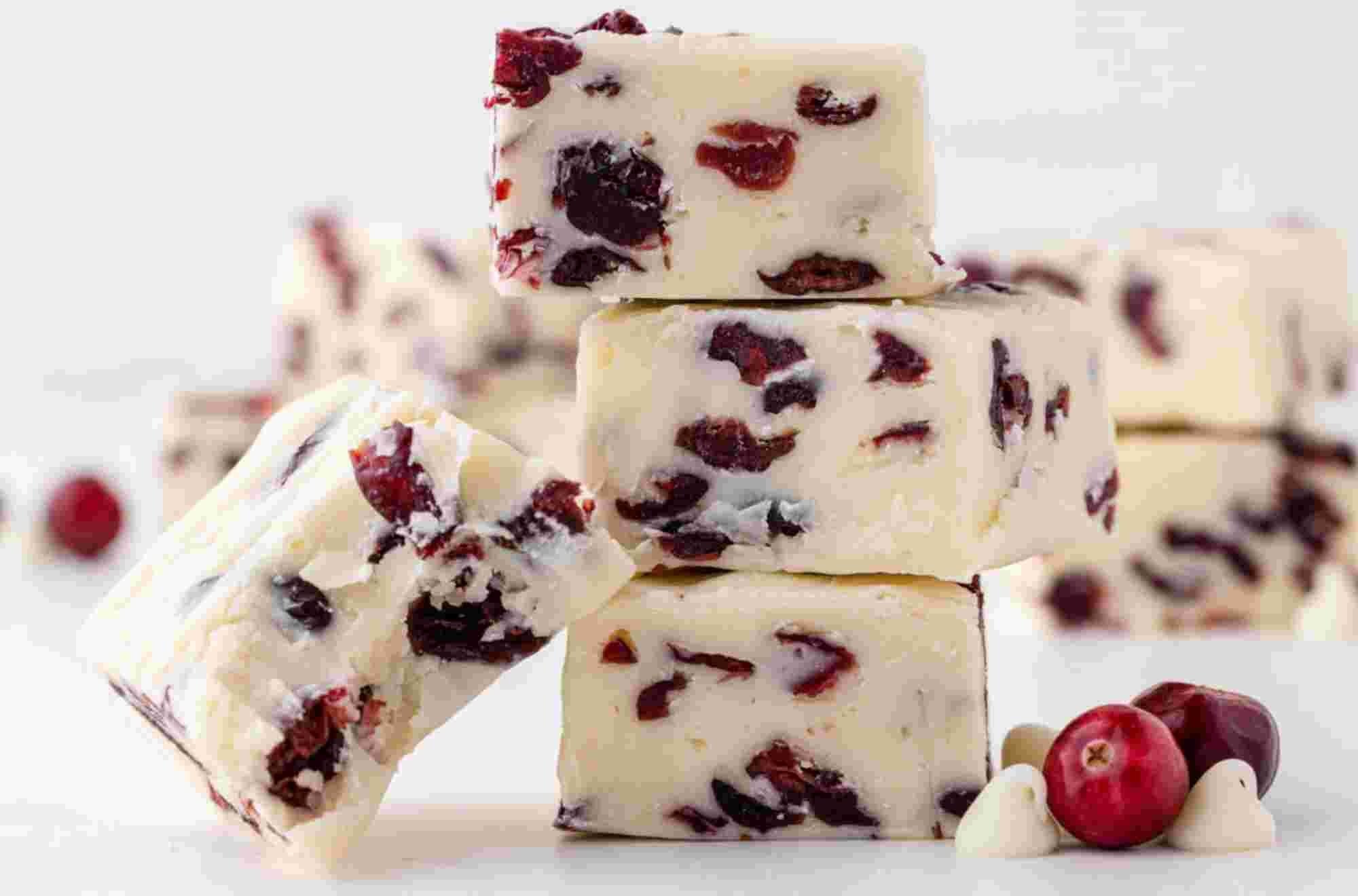 Red Fruit Almond Nougat Delectable Almond and Red Fruit Brittle-Nougat, a tempting blend of roasted almonds, vibrant red fruits, and decadent nougat candy, crafted with care by Andy Anand Chocolates. A delightful All Products, Products, Soft Brittle Nougat, Brittle, Brittle / Turron experience.