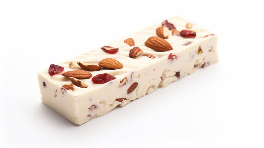 Red Fruit Almond Nougat Delectable nougat candy featuring roasted almonds, red fruits, and wildflower honey, handcrafted with artisanal care. Andy Anand Chocolates, All Products, Products, Soft Brittle Nougat, -Brittle, Brittle / Turron