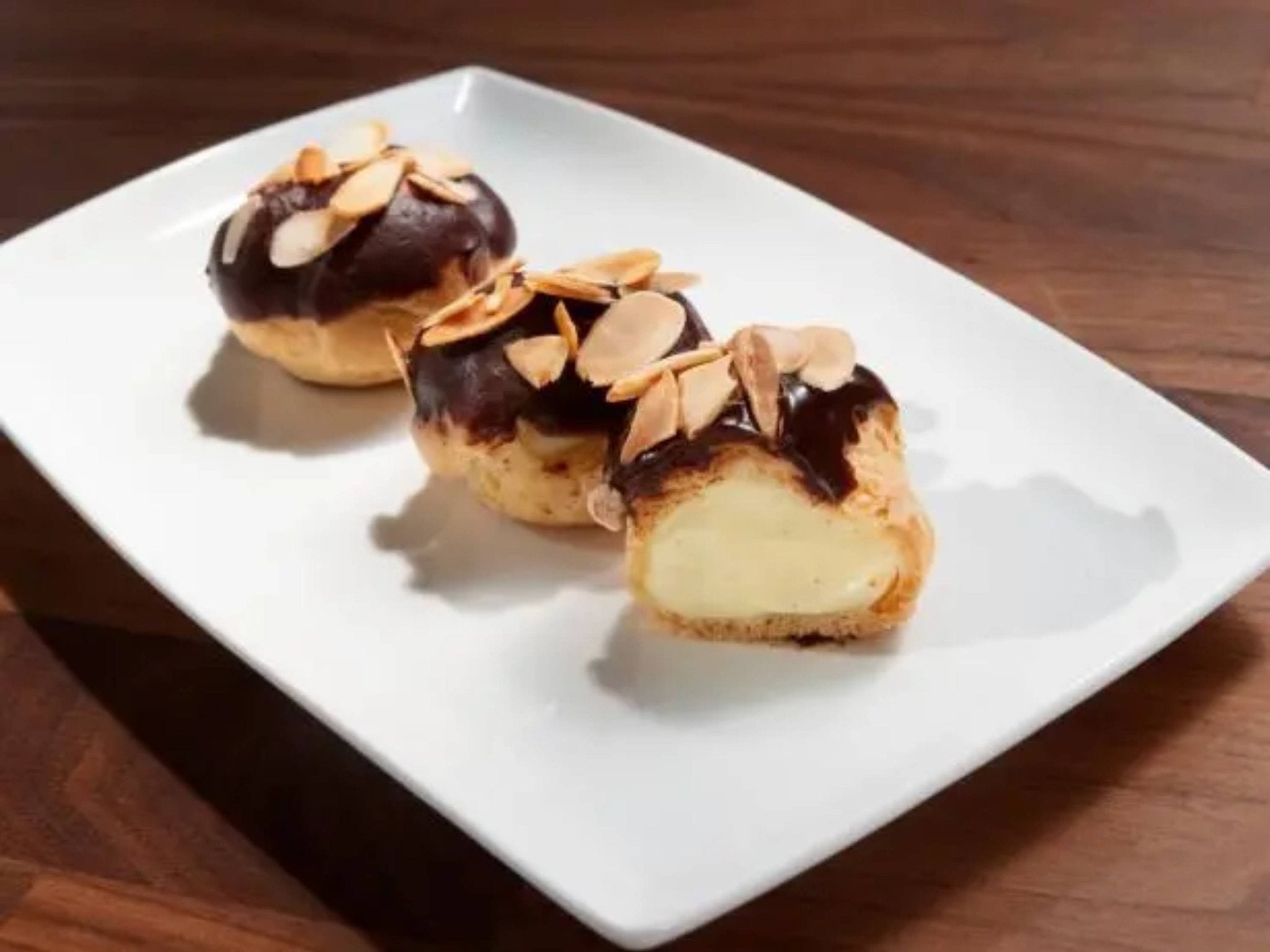 Fresh Dark Chocolate Profiterole almonds