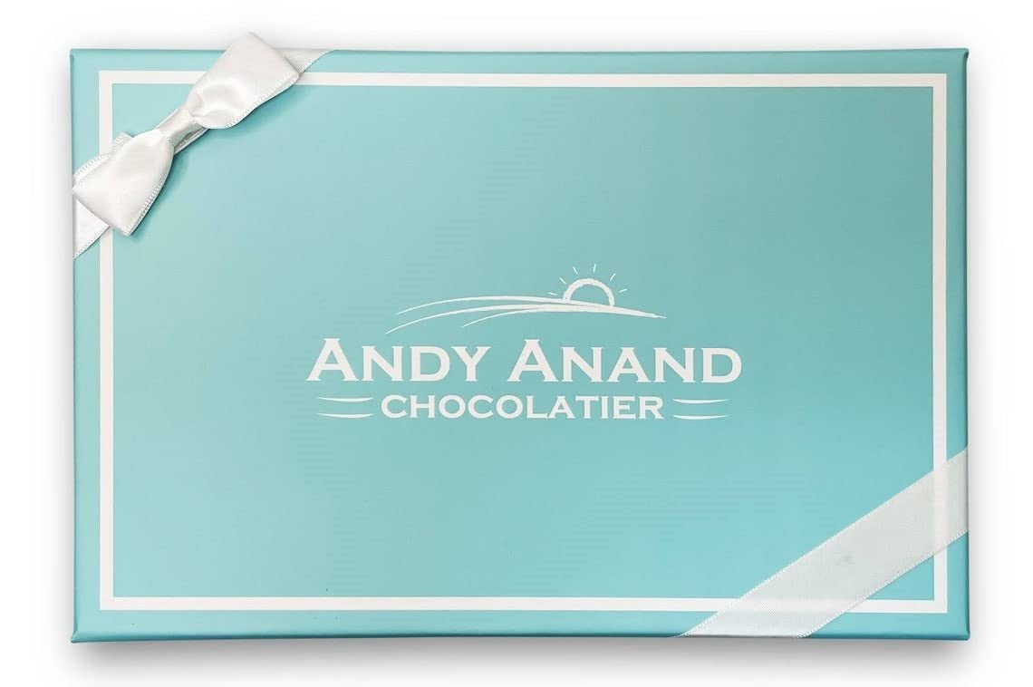 Sugar Free Chocolate Strawberry Cake A light blue rectangular box with a white ribbon bow in the top-left corner, featuring the logo and text 'Andy Anand Chocolatier' in the center. Andy Anand Chocolates, All Products, Products, Sugar Free Cake, Keto Cakes