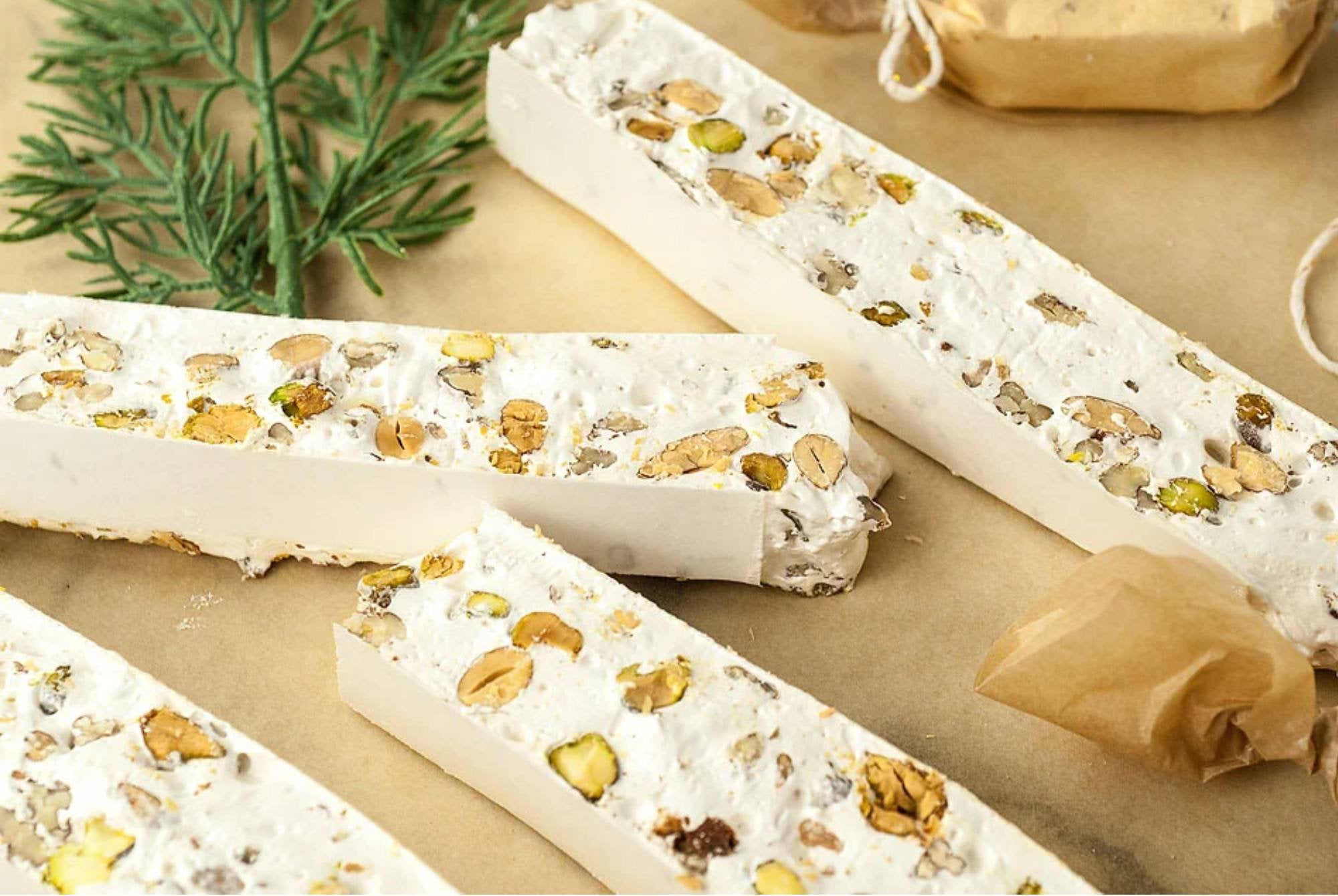 Mixed Nut Nougat torrone candy Mixed nut soft brittle, nougat, and turrón made with wildflower honey, a delicious Spanish confectionery from Andy Anand Chocolates. All Products, Products, Soft Brittle Nougat,-Brittle, Brittle / Turrón