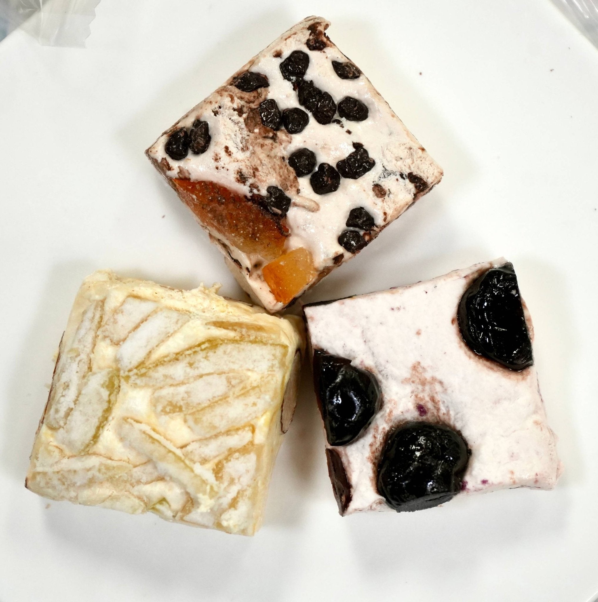 Almond Nougat Turron Candy Delightful soft nougat brittle with roasted almonds, cherries, chocolate orange, and lemon - a luxurious confection from Andy Anand Chocolates, All Products, Products, Soft Brittle Nougat, -Brittle, Brittle / Turron.