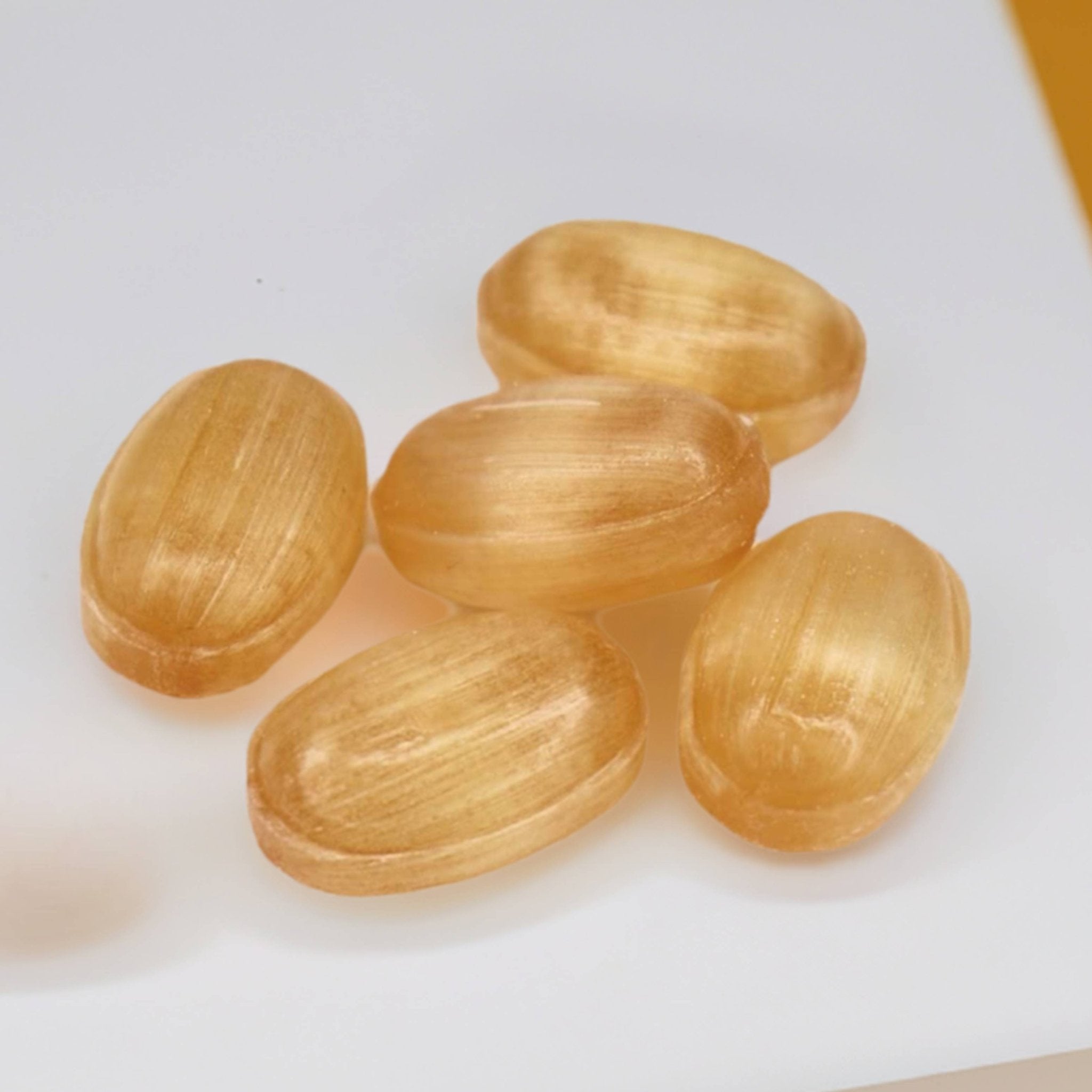 Sugar Free Ginger Turmeric Hard Candy Sugar-free ginger turmeric hard candies from Andy Anand Chocolates, a collection of all-natural, keto-friendly products.