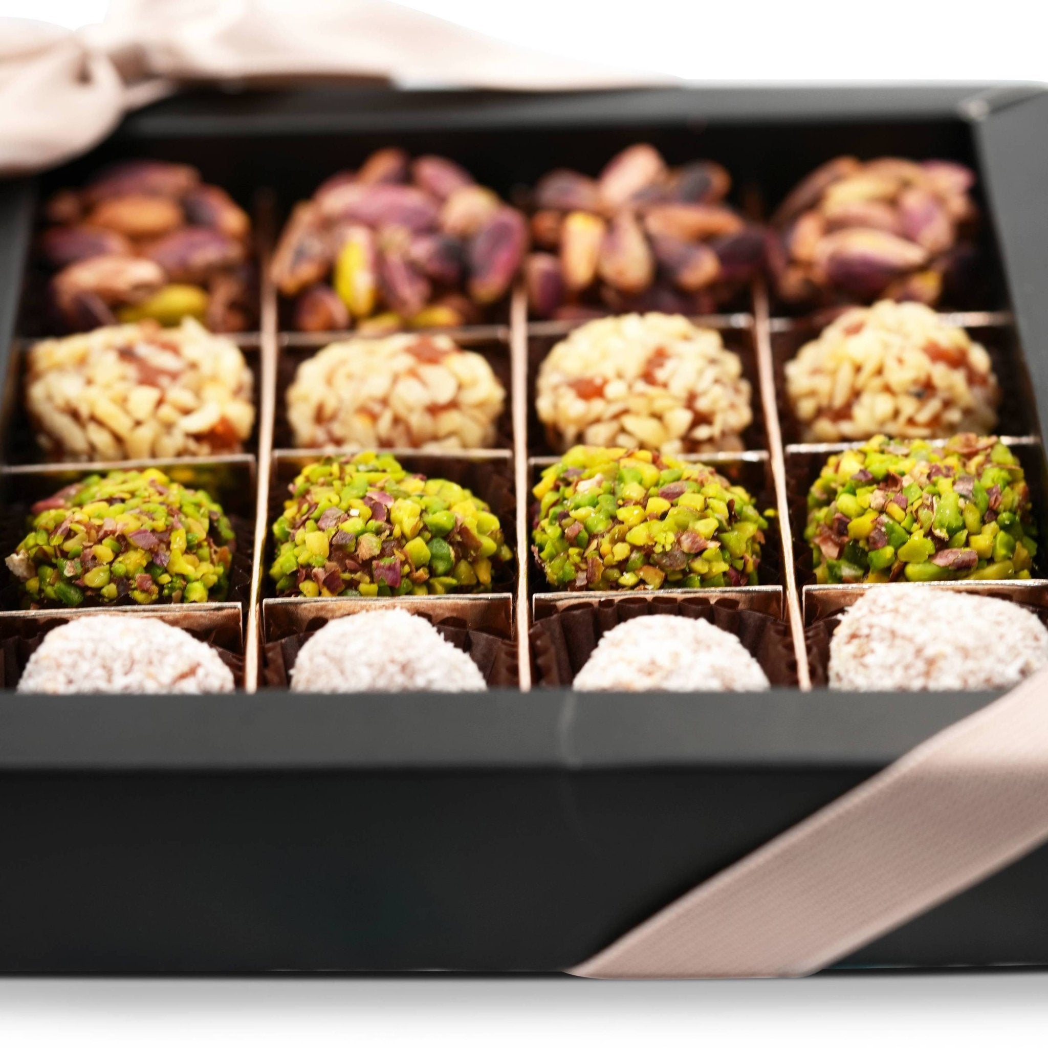 Andy Anand 16-piece Sugar Free Truffles assortment with dates, pistachio, hazelnut, and coconut, beautifully packed.