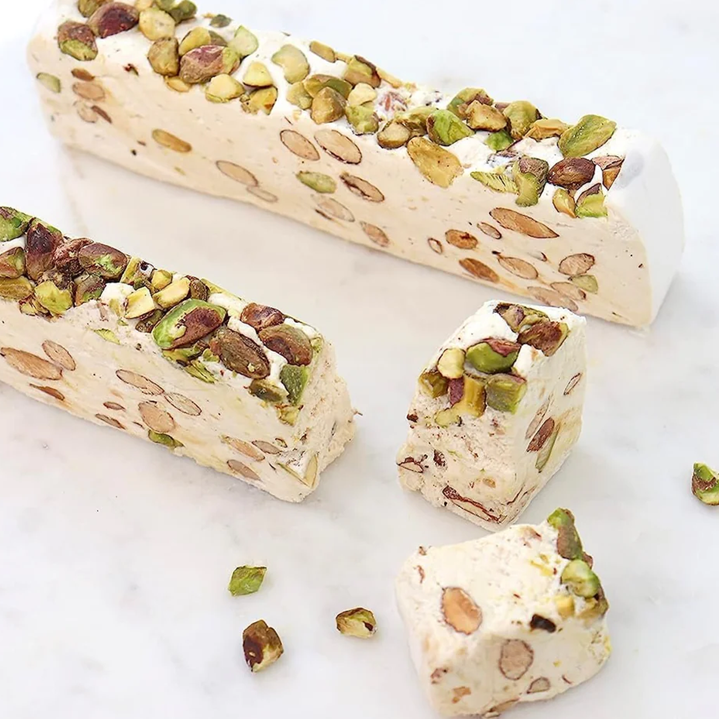 Andy Anand roasted pistachio nougat turron, crunchy and sweet, a perfect gourmet treat or gift.