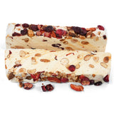 Roasted almonds with red fruits, nougat, and turron with wildflower honey - a delicious gourmet confection by Andy Anand Chocolates. All Products, Products, Soft Brittle Nougat, Brittle, Brittle / Turron.