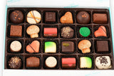 A selection of delicately crafted Belgian chocolate truffles, artistically arranged in an elegant gift box. The truffles feature a variety of flavors and textures, including creamy ganaches, nutty fillings, and decadent coatings, showcasing the exceptional craftsmanship of the Andy Anand Chocolates brand. Andy Anand Chocolates, All Products, Products, Chocolate Truffles- Free 2nd Day Air